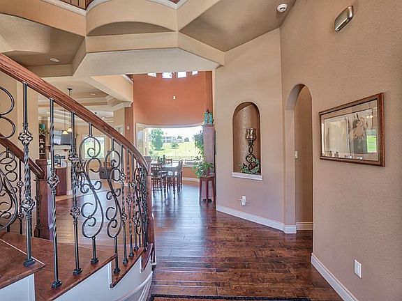 Elegant and graceful entryway into a Custom Built home.