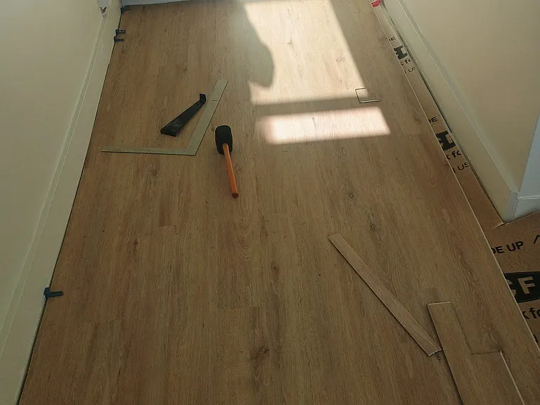 In progress photo of new floors and walls