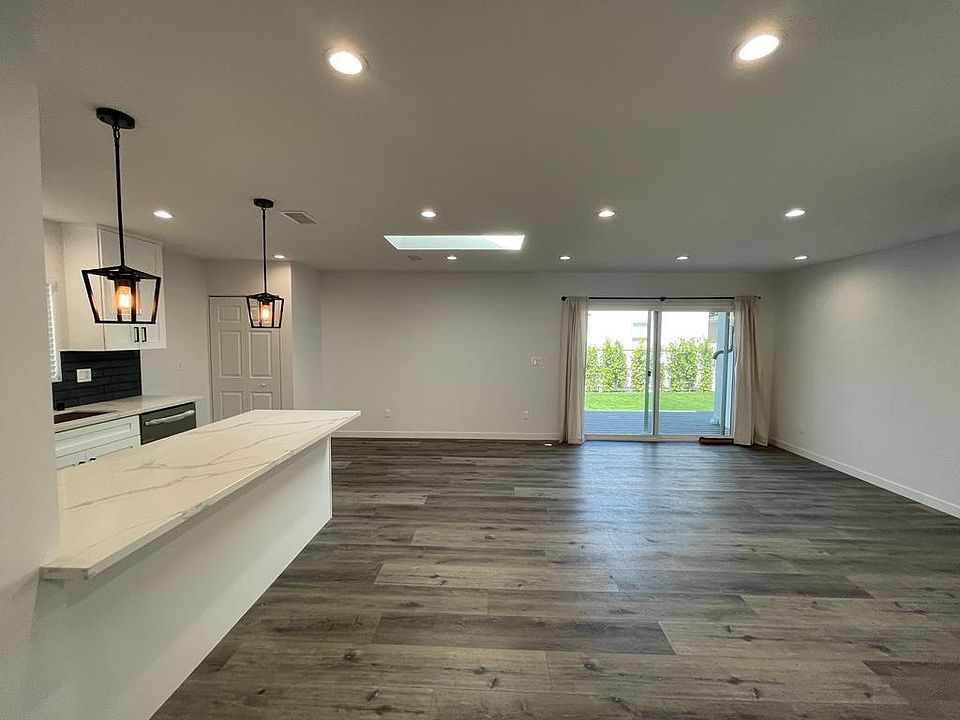 Open floor with opening to the back yard