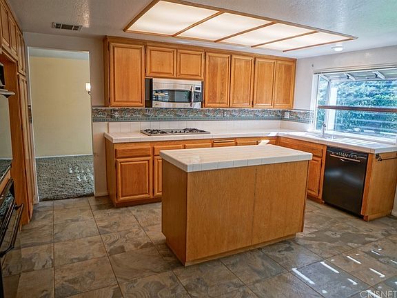 Open kitchen with eat-in breakfast nook, just off