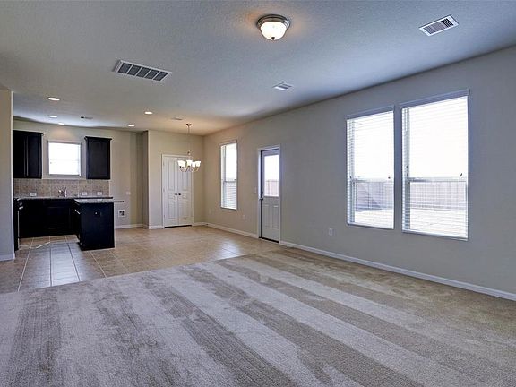 The kitchen is open to the living room, making entertaining seamless.
