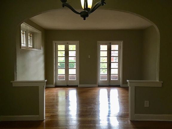 Open floor plan for Dining, Living and Front Patio Space