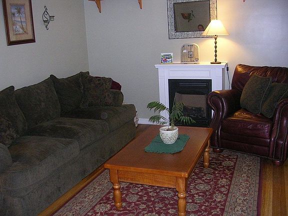 Beautiful living room with hardwood floors and fireplace.