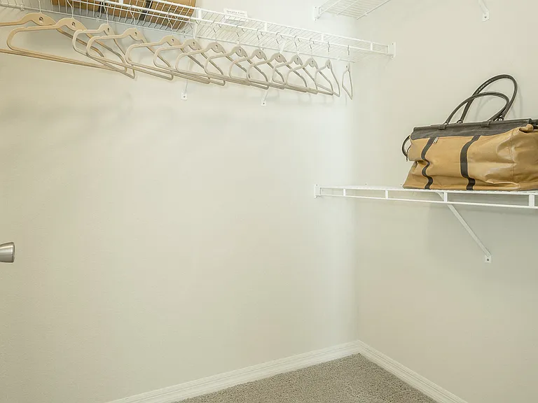 Spacious walk-in closet at Amberleigh Ridge