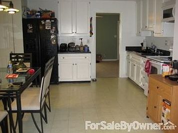 Eat-in Kitchen
						:
						Laminate flooring, neutral paint and counter top.