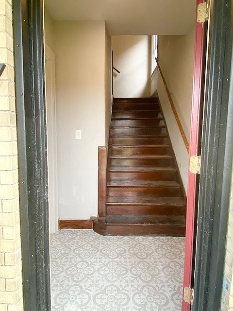 Remodeled vestibule retains the historic charm of the house and allows you to greet visitors without allowing them directly into your home.