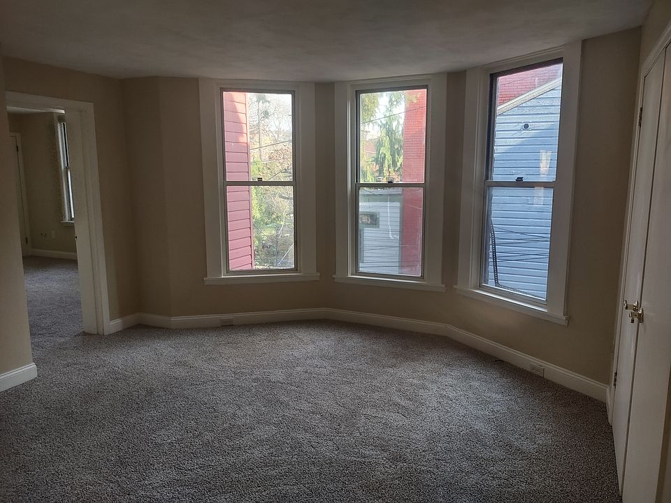 bedroom with bay windows