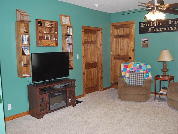 view of newer carpet and solid 6 panel doors