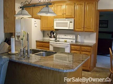 Kitchen
						:
						With granite counter tops