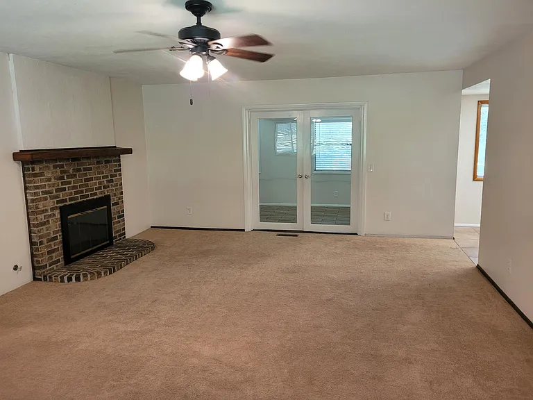 Just inside front door.