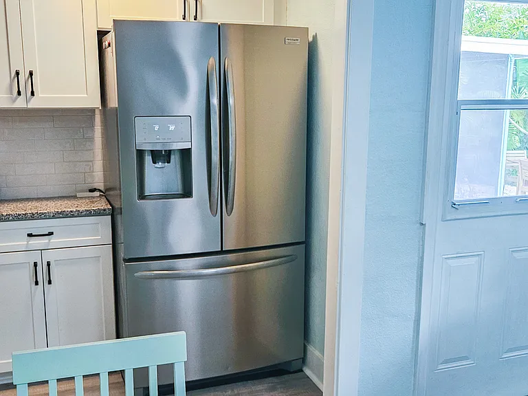 Refrigerator with ice maker and filtered water