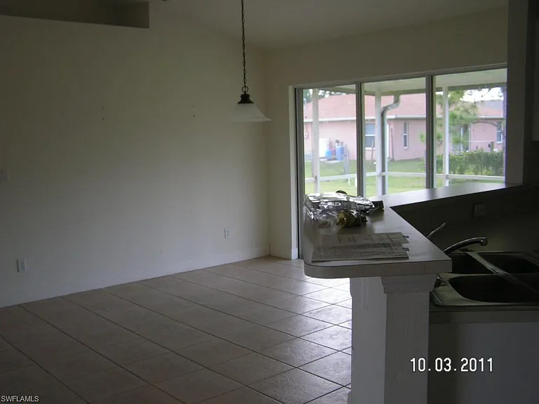 Dinning area, partial view of kitchen