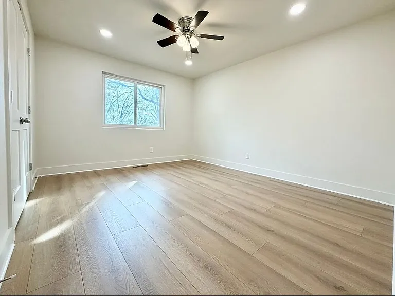 View across guest bedroom from door entry