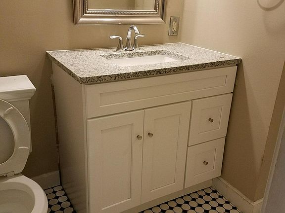 Full bath with new vanity