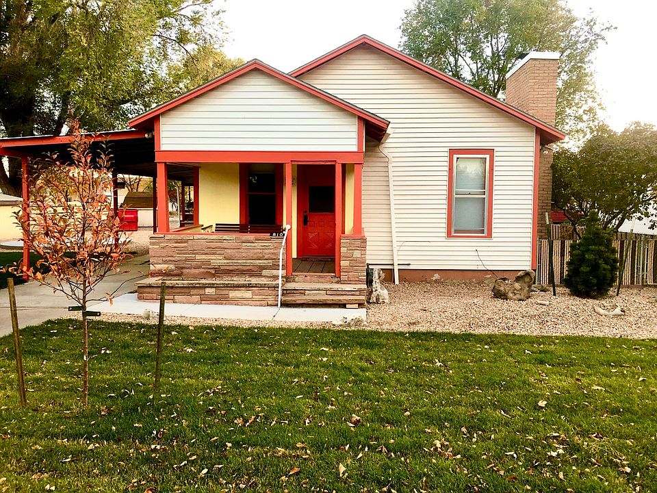 Front of our house, yard, and covered front porch