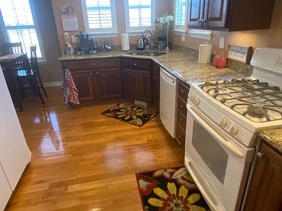 Kitchen, Granite Counter and Wood Floors