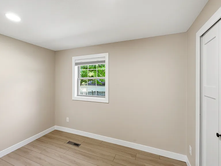 Secondary bedroom with walk-in closet