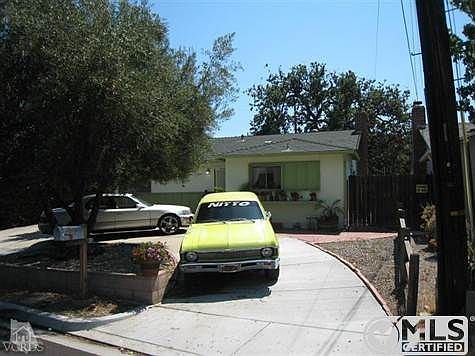 Front of main house. Circular driveway