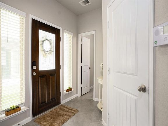 Let's take a tour. There is a half bath to the left.