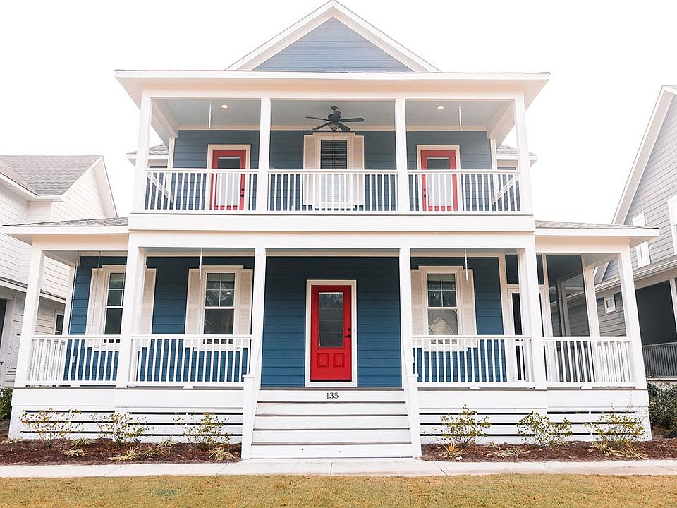 House Front - wrap around bottom porch, upstairs deck porch