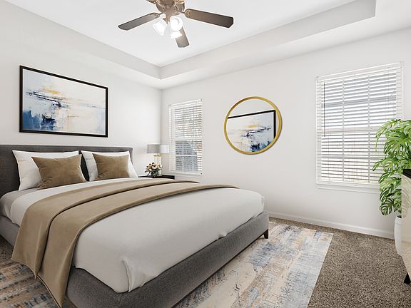 Primary Suite has tray ceiling and new carpet.
Virtually staged