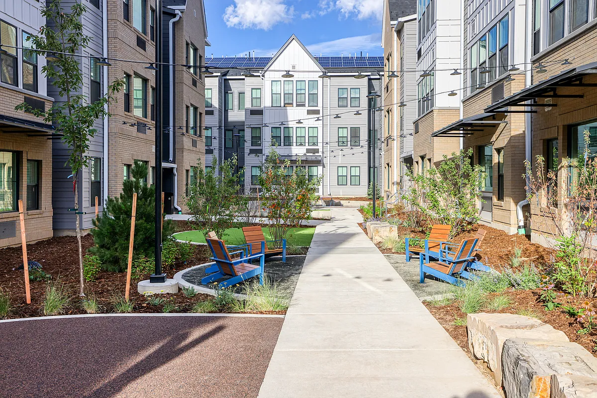 Seating area next to play area at Los Altos, in the resident courtyard - Los Altos