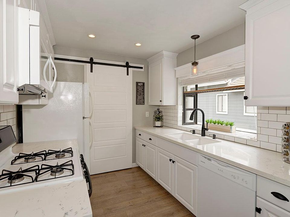 Quartz Countertops, Tile Backsplash, & New Appliances