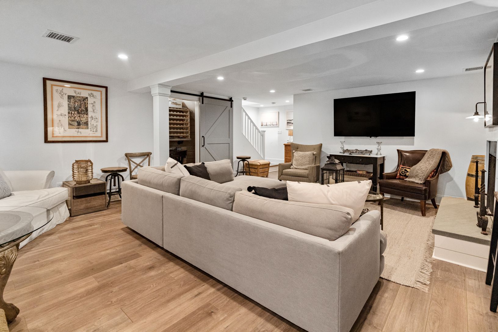  Large screen TV and L-shaped couch 