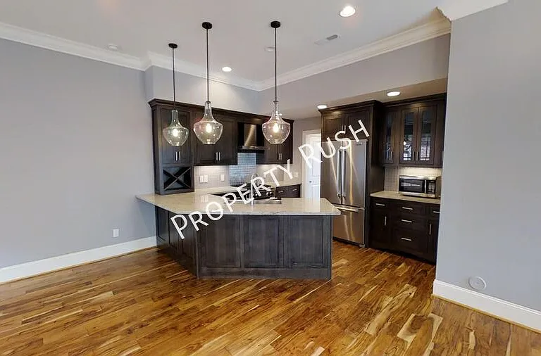 105 E 3rd St — Photo 11