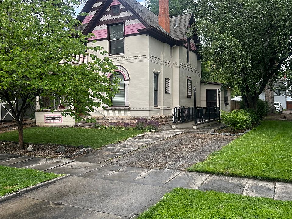 Front exterior. This unit has front parking spot shown here. There is a second parking spot off the back alley.