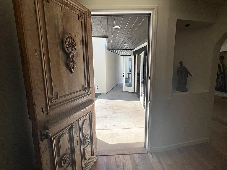 Living Room with Double French doors in front and back!