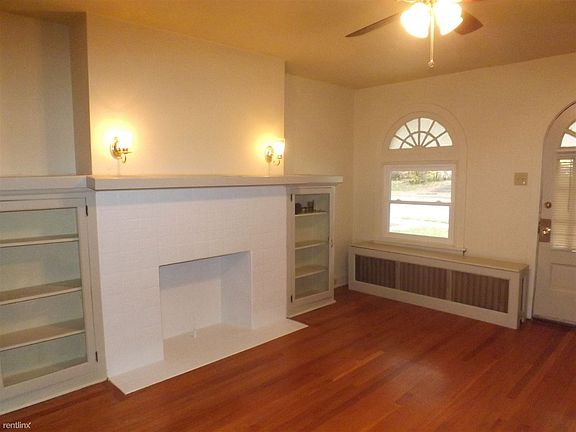 Fresh paint, hardwood floors, ceiling fan and new windows in