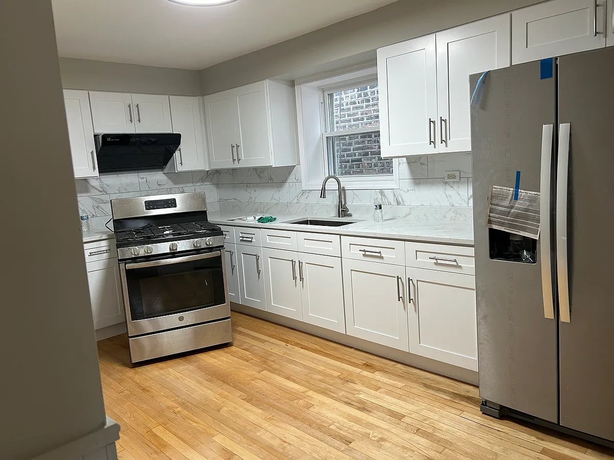 Building Photo - 2921 S Lowe Ave #1