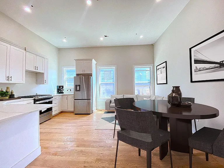 Sunny kitchen and living area, oversized windows