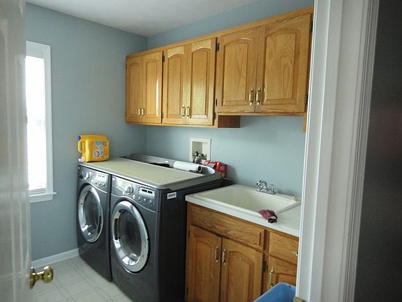 Laundry room is spacious and has a sink. 