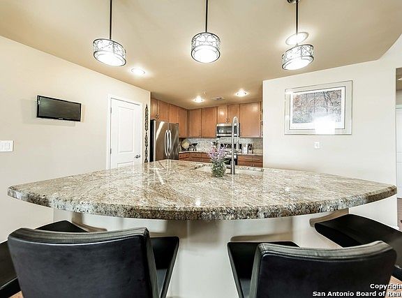 5th image of 215 N Center APT 803