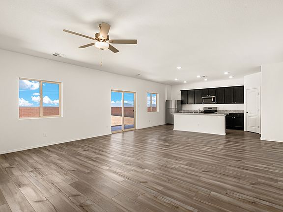 The living area opens to the backyard