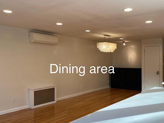 The dining area, viewed from the kitchen.