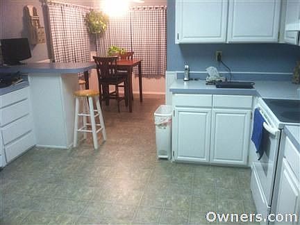 Large kitchen with lots of cabinets and counter space