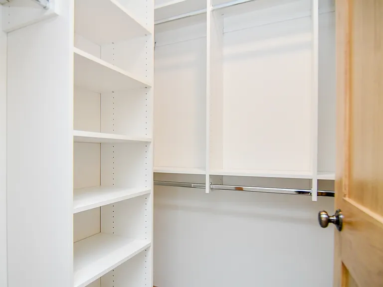 First floor master bedroom walk in closet