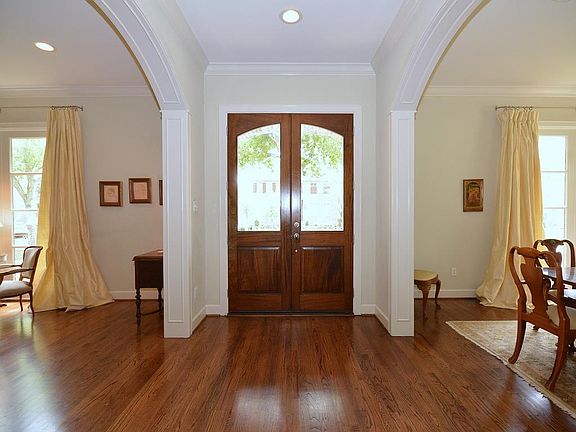 Large entry open to formals. Hardwoods throughout downstairs and all upstairs common areas.