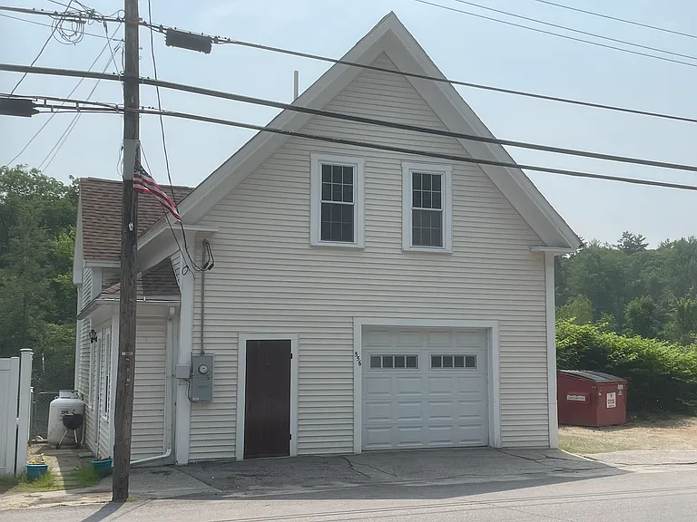 One off street parking spot is on the right side of the home. Enter on the left, where you will find a hallway and stairs to the second floor apartment.