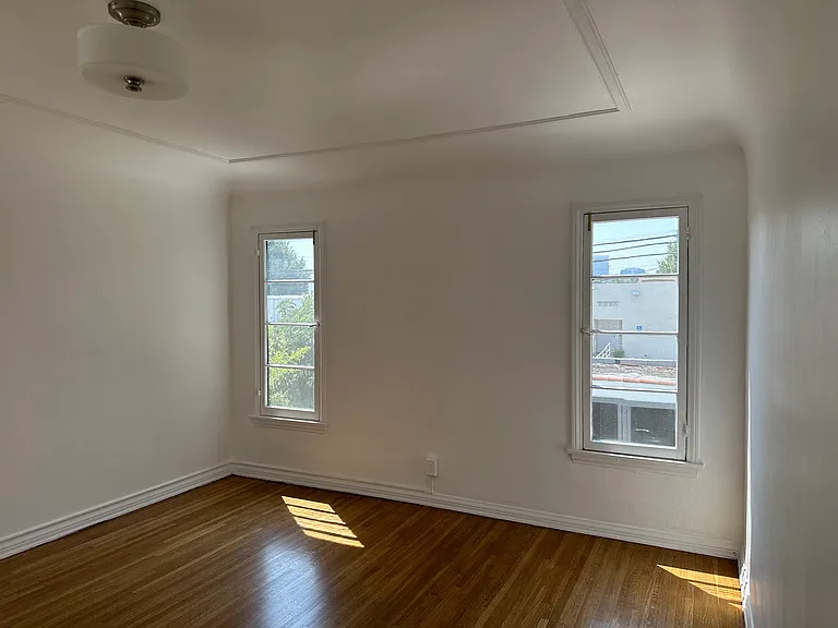 Bedroom #3, with two closets, one is a walk-in