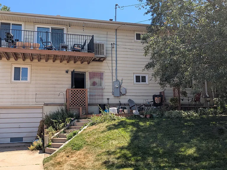 rear, attached garage, yard