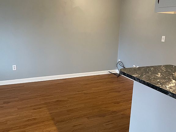 Granite counter tops, Luxury vinyl plank flooring.