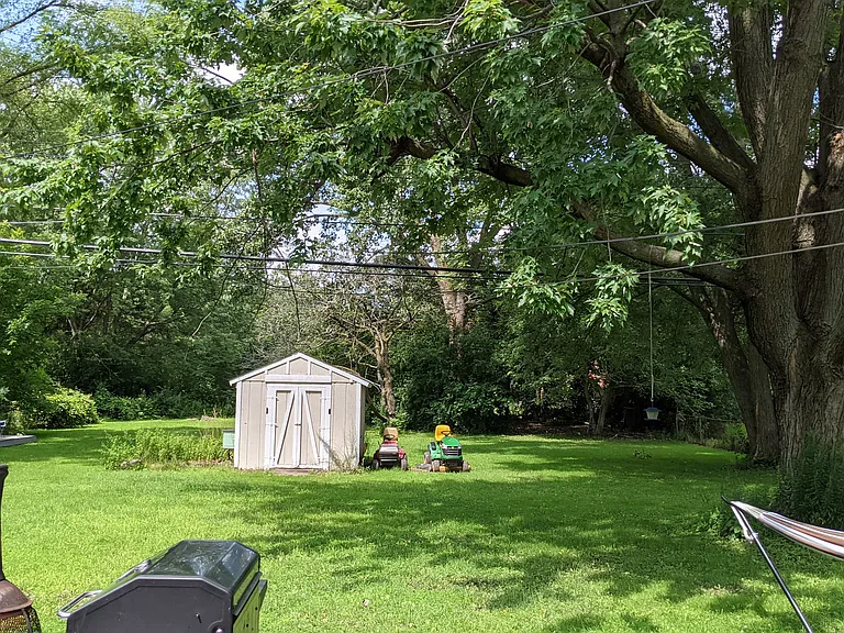 Sprawling o.7 acre fenced backyard. Great for pets!