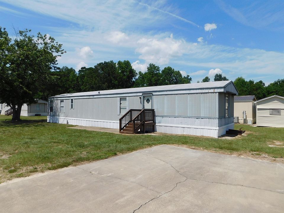 Front View of Home with 2 Car Parking Pad