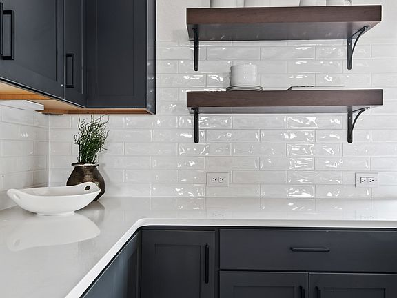 Elegant floating shelves in kitchen