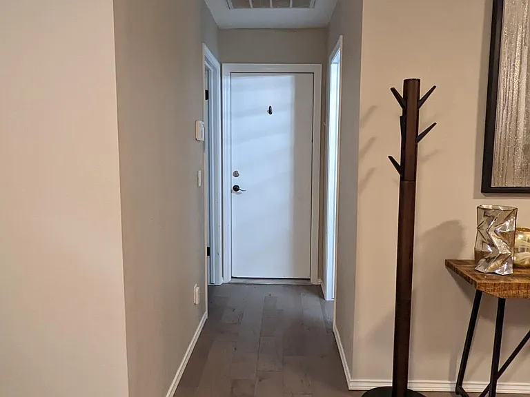 3rd bedroom on left, Hall bath on right; garage through the door