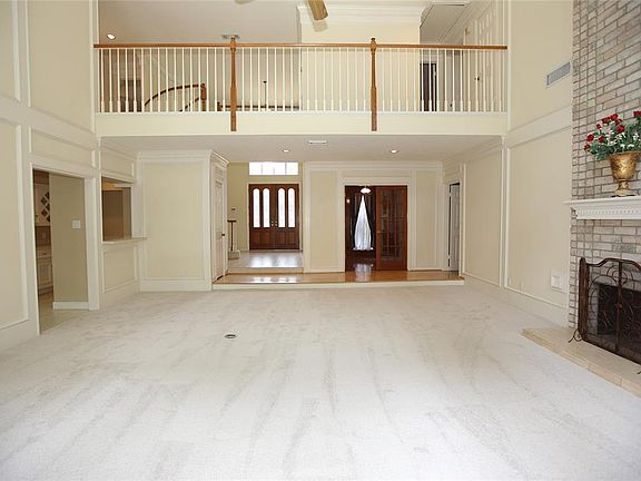 From the main living area, you an see the catwalk above, as well as the study.